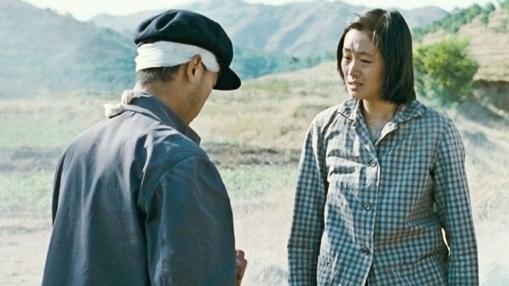 Кадр из фильма «Жить (1994)»